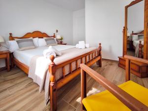 Postel nebo postele na pokoji v ubytování Villa Exclusiva, Piscina Privada y Vistas al Mar + 56 fotografií