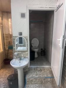 Koupelna v ubytování MI Hostel