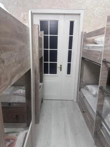 Postel nebo postele na pokoji v ubytování MI Hostel