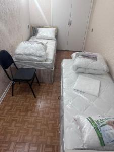Postel nebo postele na pokoji v ubytování MI Hostel