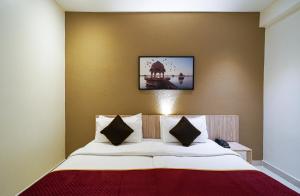 Postel nebo postele na pokoji v ubytování Open Hotel by Olive - Langford Suites