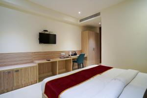 Postel nebo postele na pokoji v ubytování Open Hotel by Olive - Langford Suites