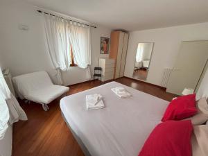 Posteľ alebo postele v izbe v ubytovaní Casa Vacanze Magnolia