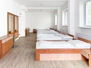 Postel nebo postele na pokoji v ubytování Beskydy House