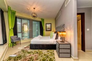 Ένα ή περισσότερα κρεβάτια σε δωμάτιο στο Bellavista - High Floor - 1BR - 29 Boulevard - Burj Khalifa & Fountain View +15 φωτογραφίες