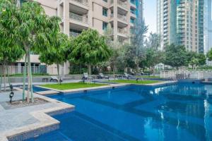 Πισίνα στο ή κοντά στο Bellavista - High Floor - 1BR - 29 Boulevard - Burj Khalifa & Fountain View