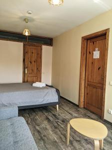 Postel nebo postele na pokoji v ubytování Guest House Kamara