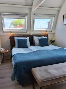 Postel nebo postele na pokoji v ubytování Appartement Havenzicht