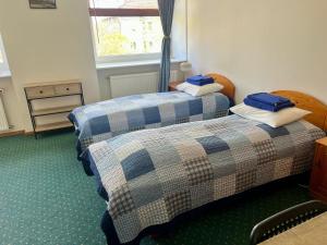 Postel nebo postele na pokoji v ubytování Paldiski Hotel