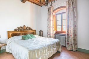 Ένα ή περισσότερα κρεβάτια σε δωμάτιο στο La Casa delle Bartaline