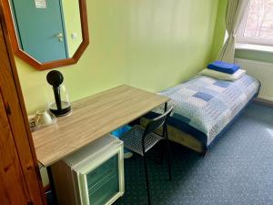 Postel nebo postele na pokoji v ubytování Paldiski Hotel
