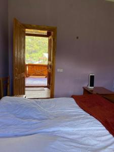 Letto o letti in una camera di Lia Jamdeliani Guest House
