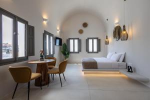 Postel nebo postele na pokoji v ubytování Niabelon Suites + 37 fotografií