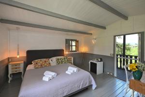 Foto dalla galleria di La Grande Via, ospitalità in Maremma a Montemerano