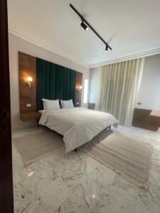 Postel nebo postele na pokoji v ubytování Appart hotel lac 2 Tunis
