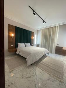Postel nebo postele na pokoji v ubytování Appart hotel lac 2 Tunis