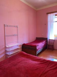 Letto o letti in una camera di Lia Jamdeliani Guest House