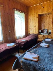 Letto o letti in una camera di Lia Jamdeliani Guest House