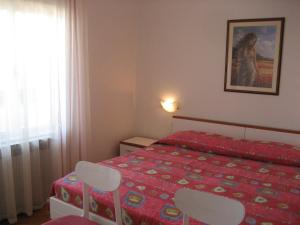 Posteľ alebo postele v izbe v ubytovaní Apartment IDA