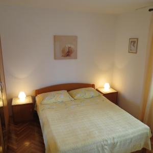 Posteľ alebo postele v izbe v ubytovaní Apartment IDA