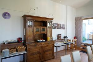 Kuchyň nebo kuchyňský kout v ubytování Hotel Ambert