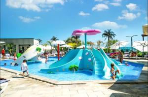 an image of a water park with a slide at Alezzi Beach Resort Pool &Spa in Mamaia Sat/Năvodari