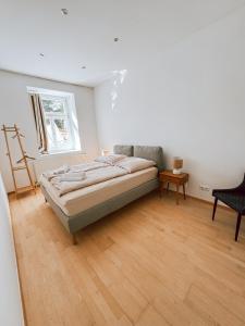 Posteľ alebo postele v izbe v ubytovaní Zentrales Apartment nähe Schönbrunn - 5 Pers