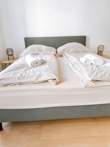 Posteľ alebo postele v izbe v ubytovaní Zentrales Apartment nähe Schönbrunn - 5 Pers