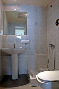Koupelna v ubytování Semeli Hotel