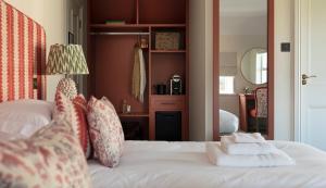 Uma cama ou camas num quarto em Teach de Broc