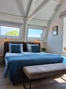 Postel nebo postele na pokoji v ubytování Appartement Havenzicht