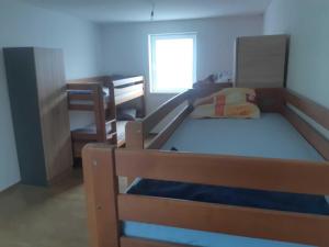 เตียงในห้องที่ Apartman Novi Sad - Apartment Novi Sad