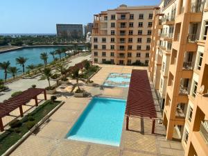 an overhead view of a swimming pool in a building at ليالينا فيو Layali View Family and Business 3 bed rooms 13 in King Abdullah Economic City