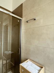 a bathroom with a shower and a walk in shower at Nonno Ciro B & B in Torre Annunziata