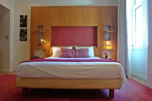 Postel nebo postele na pokoji v ubytování Semeli Hotel