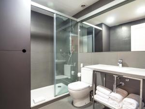 Kúpeľňa v ubytovaní Rent Top Apartments Rambla Catalunya