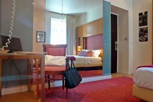 Postel nebo postele na pokoji v ubytování Semeli Hotel