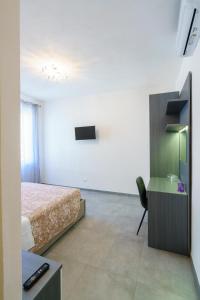 TV a/nebo společenská místnost v ubytování Home