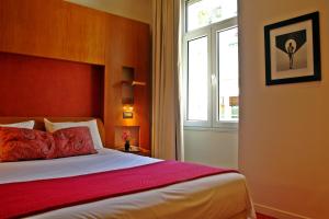 Postel nebo postele na pokoji v ubytování Semeli Hotel