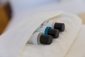 two batteries sitting on top of a piece of paper at Harts Loft - On Beach - Panoramic Sea Views - By Harbour in St Ives