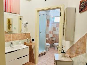 Kúpeľňa v ubytovaní Amarin Pisa Apartment + 37 fotografií