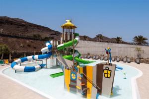 a water park with a water slide in it at Occidental Jandía Mar in Morro del Jable