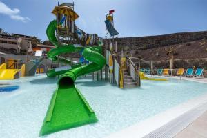 a water slide in a swimming pool at Occidental Jandía Mar in Morro del Jable