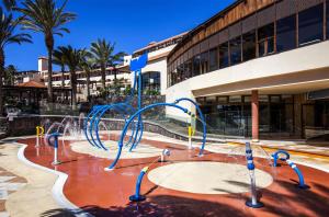 a water park in front of a building at Occidental Jandía Mar in Morro del Jable