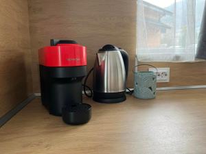 a coffee maker and a coffeemaker sitting on a counter at Villa YoSi in Sapareva Banya