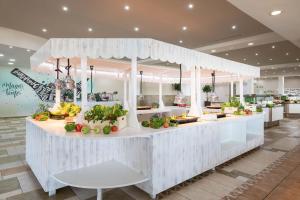 a food counter in a store with fruits and vegetables at Occidental Jandía Mar in Morro del Jable