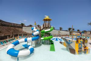 a water park with a water slide and slides at Occidental Jandía Mar in Morro del Jable