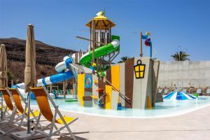 a water park with a water slide in a pool at Occidental Jandía Mar in Morro del Jable