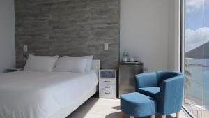 Letto o letti in una camera di One Love Motel