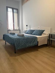 Postel nebo postele na pokoji v ubytování MARTINI e CAMPARI